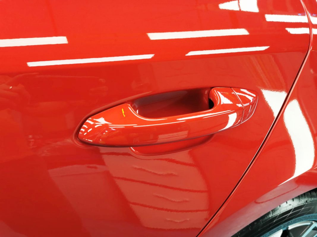 Front three-quarter view of the Kia Stinger after coating.