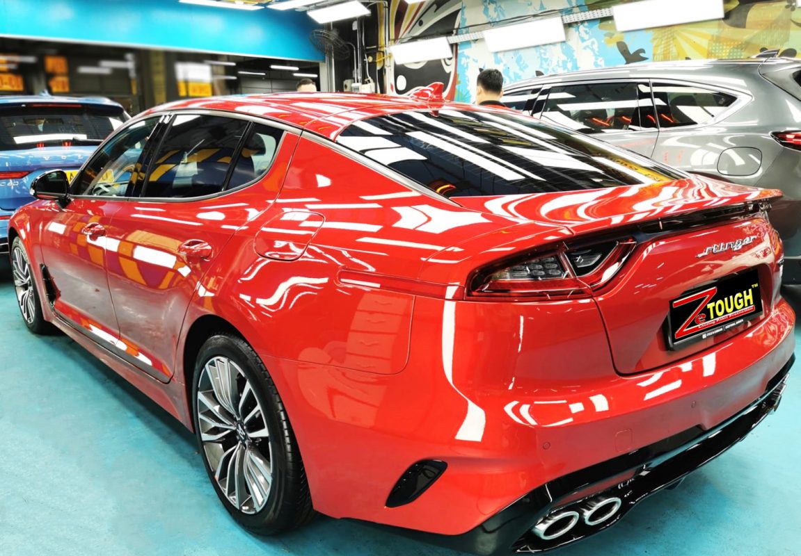 Rear quarter of the Kia Stinger, glossy and protected.