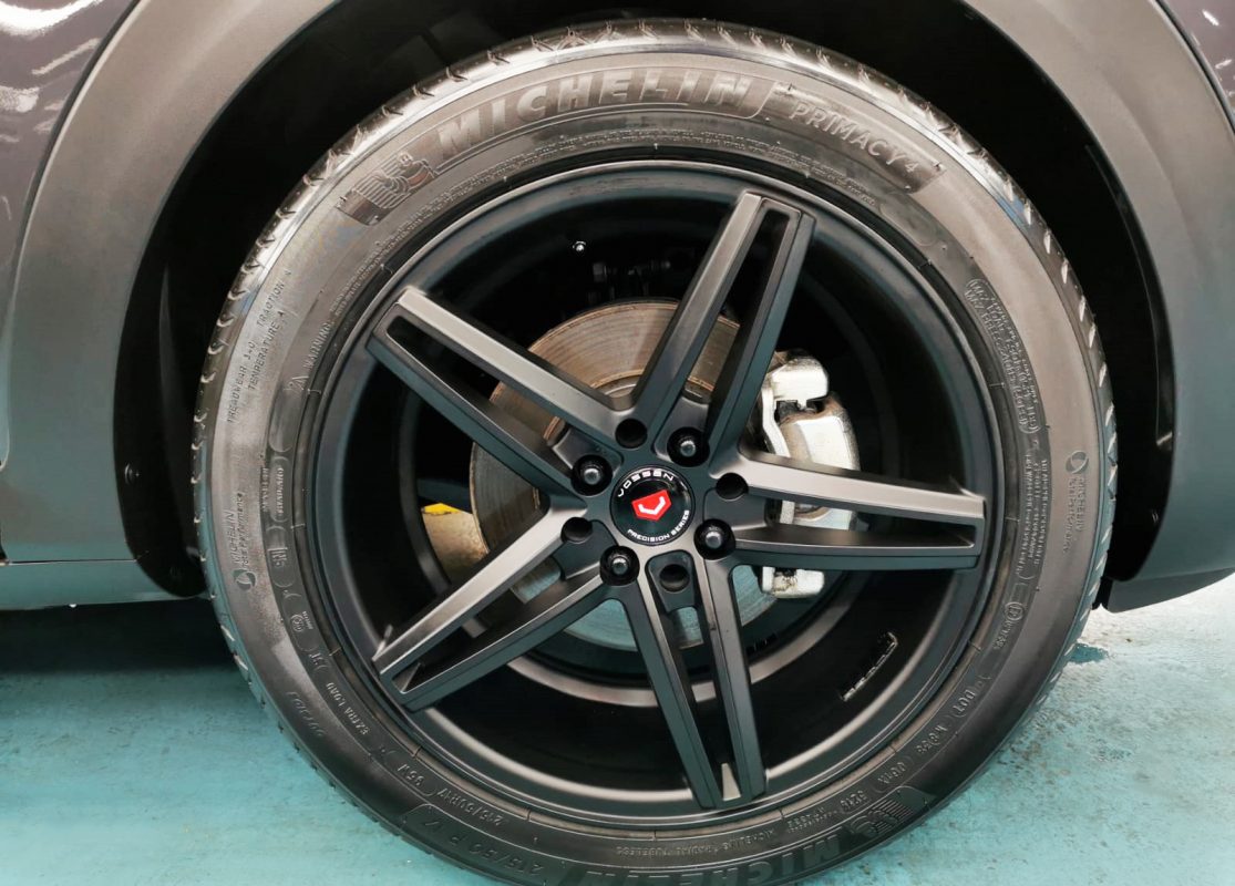 The Kia Stonic parked in the workshop, freshly coated.