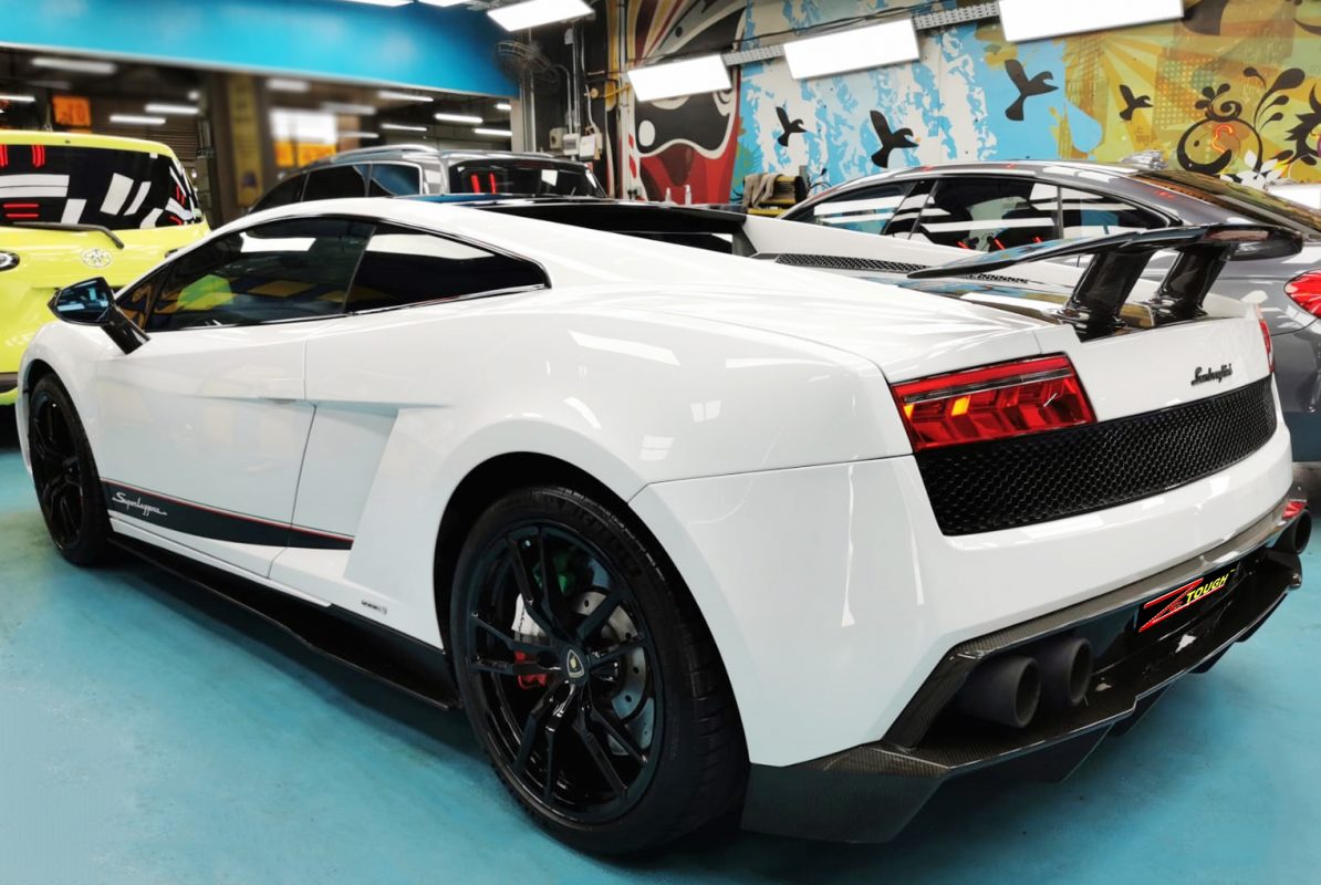 Rear quarter of the Lamborghini Gallardo, glossy and protected.