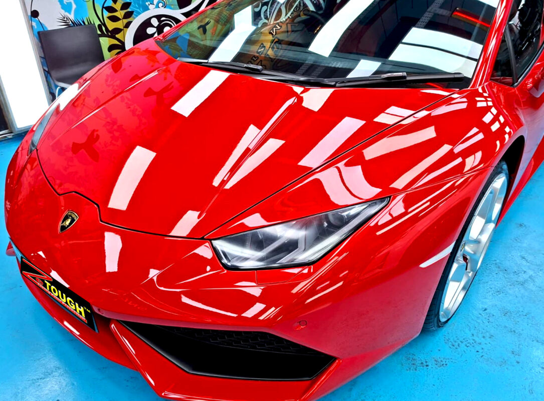 The Lamborghini Huracan's coated paintwork under workshop lighting.