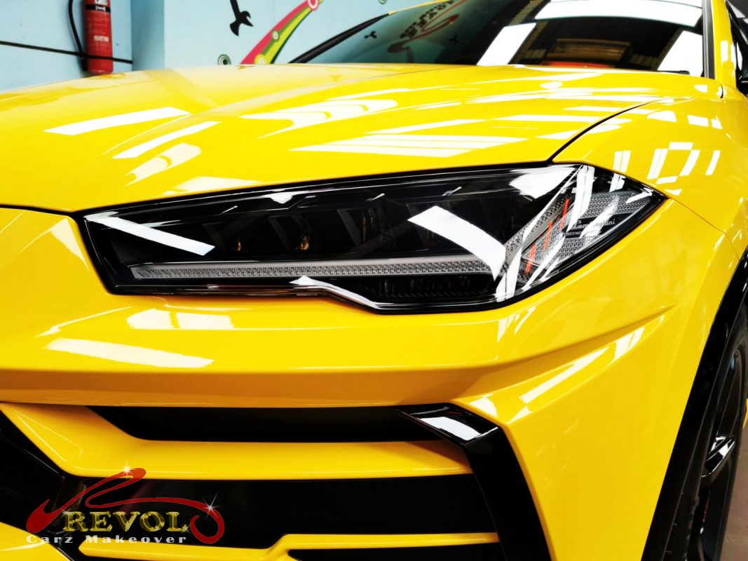The Urus's coated paintwork showing clean reflections.
