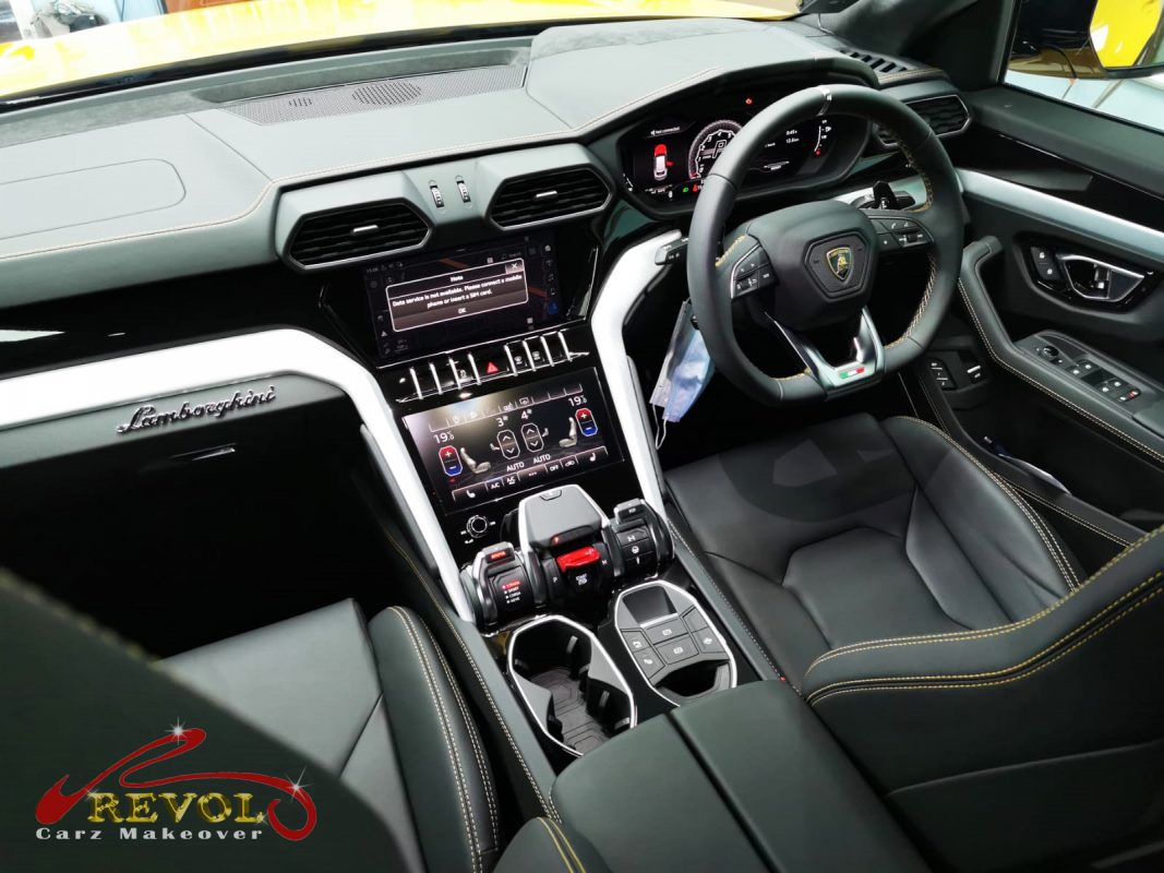 The Lamborghini Urus parked in the workshop, freshly coated.
