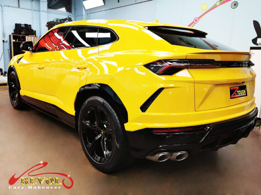 Rear quarter of the Lamborghini Urus, glossy and protected.