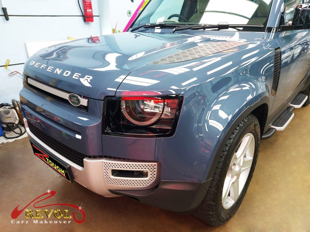 The Land Rover Defender 110 from a side angle after the ceramic coating.