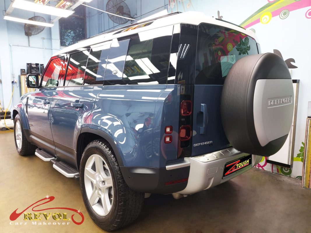 Rear quarter of the Defender 110, glossy and protected.