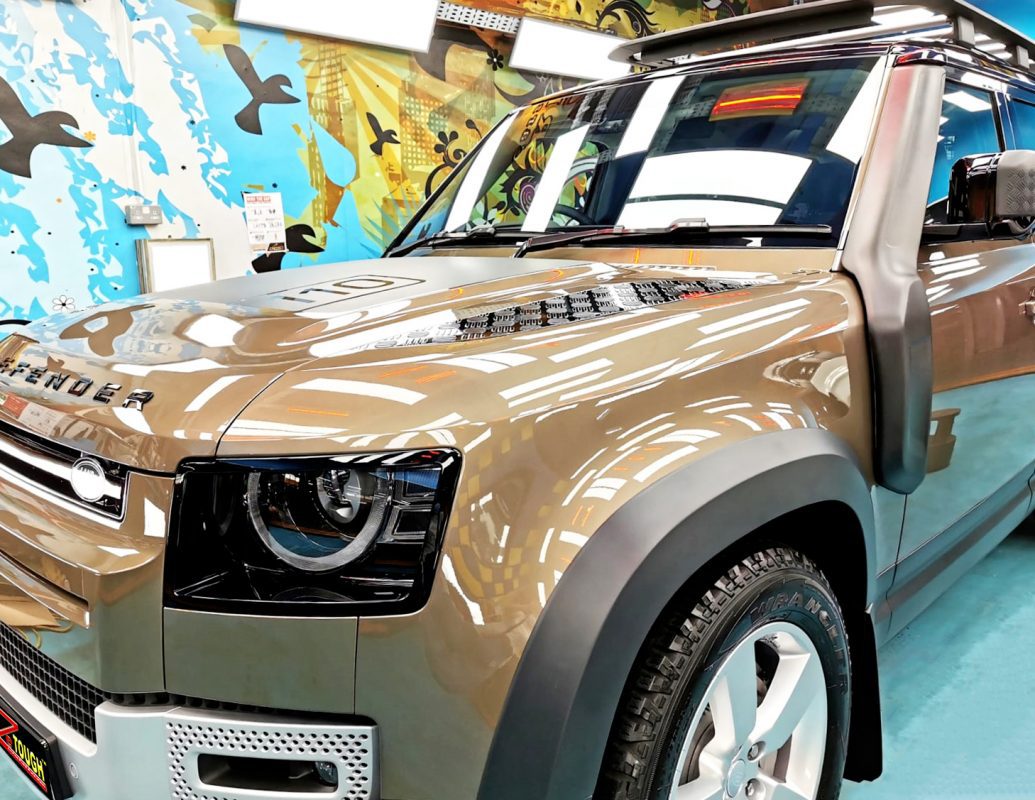 The Land Rover Defender from a side angle after the titanium coating.