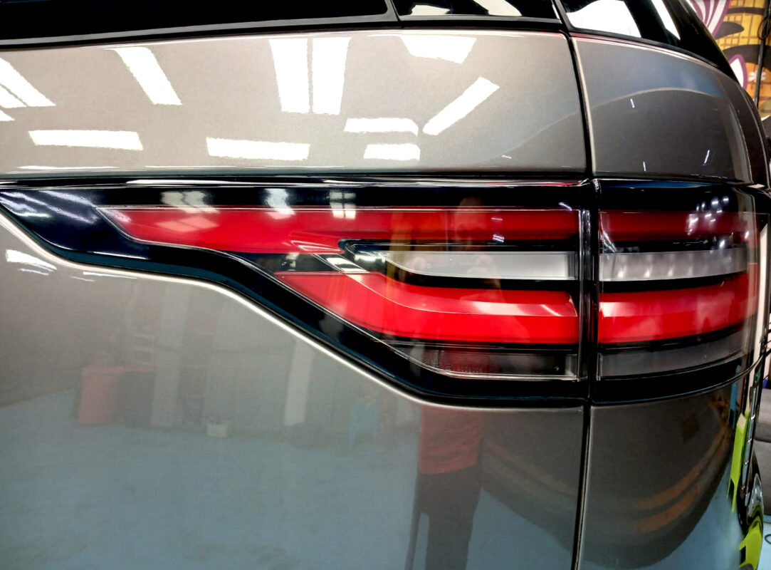 Rear quarter of the Discovery, glossy and protected.