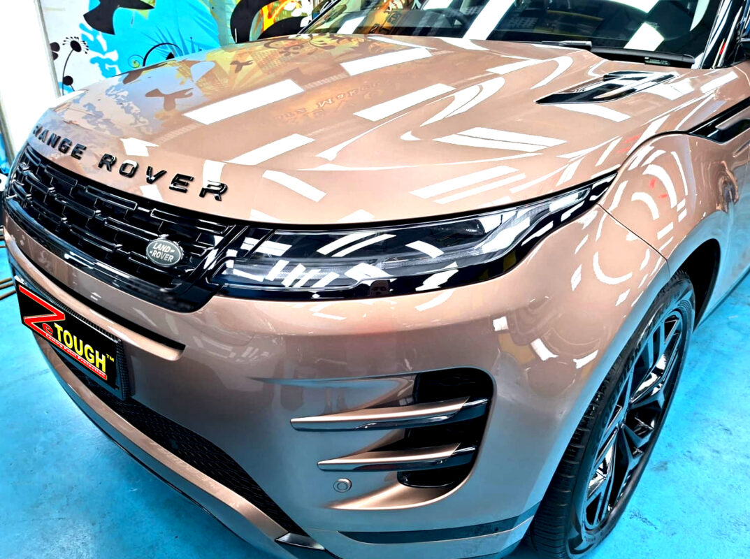 The Land Rover Range Rover Evoque's coated paintwork under workshop lighting.