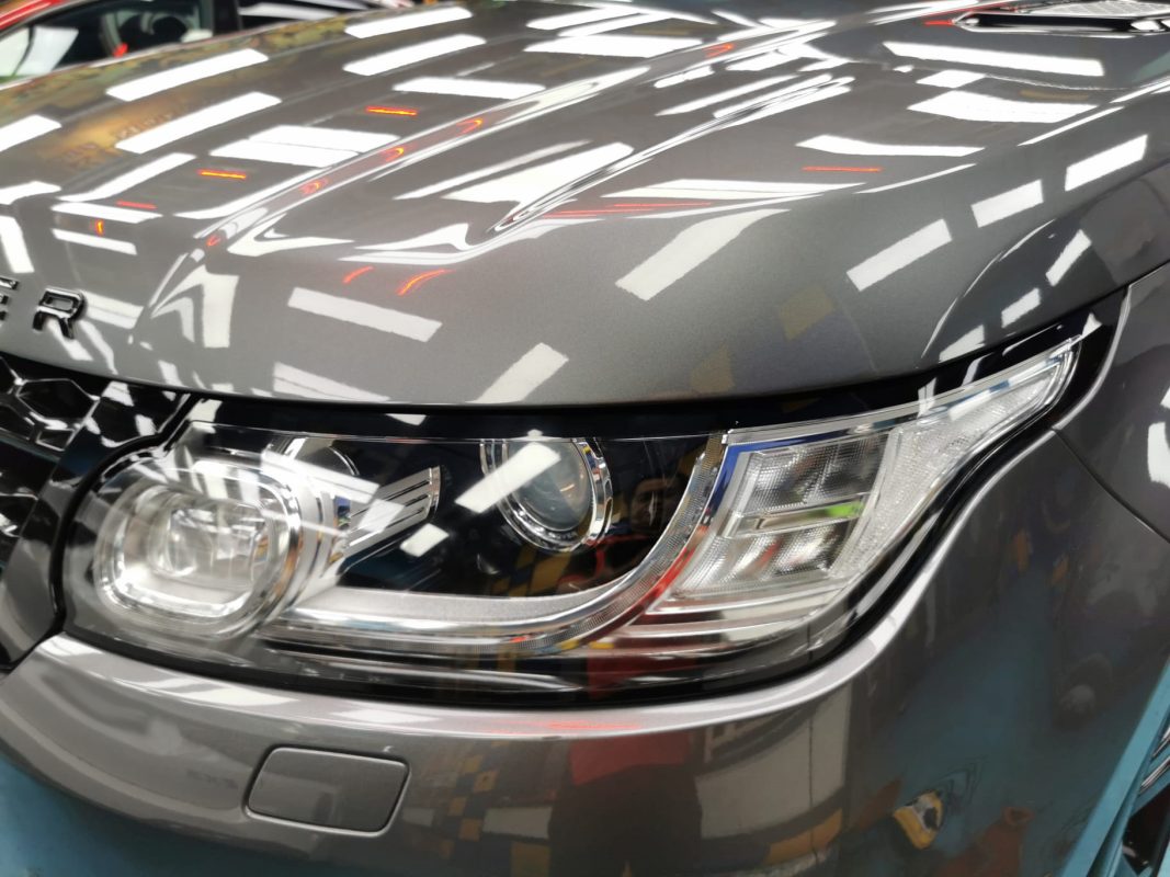 The Range Rover's coated paintwork showing clean reflections.