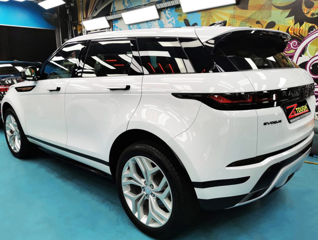 Rear quarter of the Range Rover Evoque, glossy and protected.