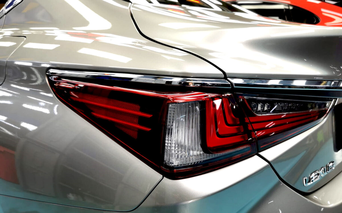 The coated bonnet of the ES250 under workshop lighting.