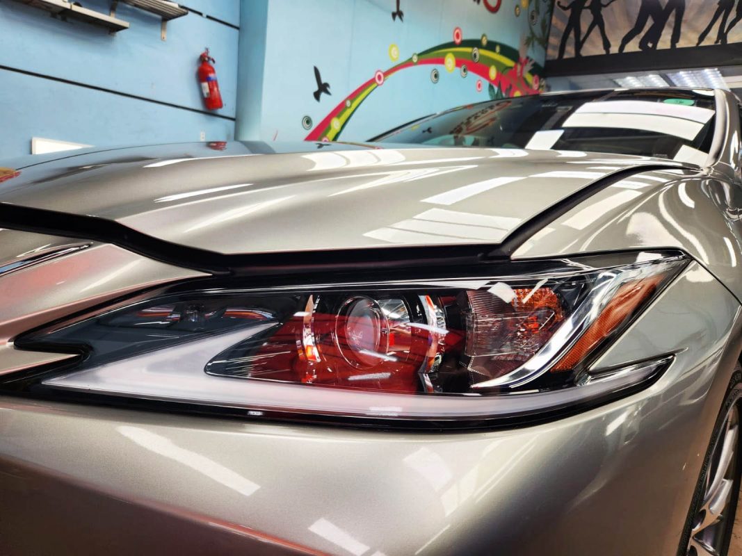 The ES250's coated paintwork holding clean reflections.