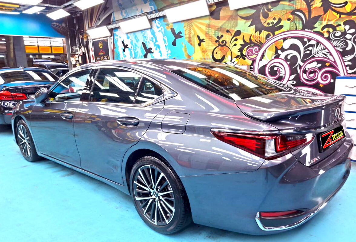 Rear quarter of the Lexus ES300H, glossy and protected.