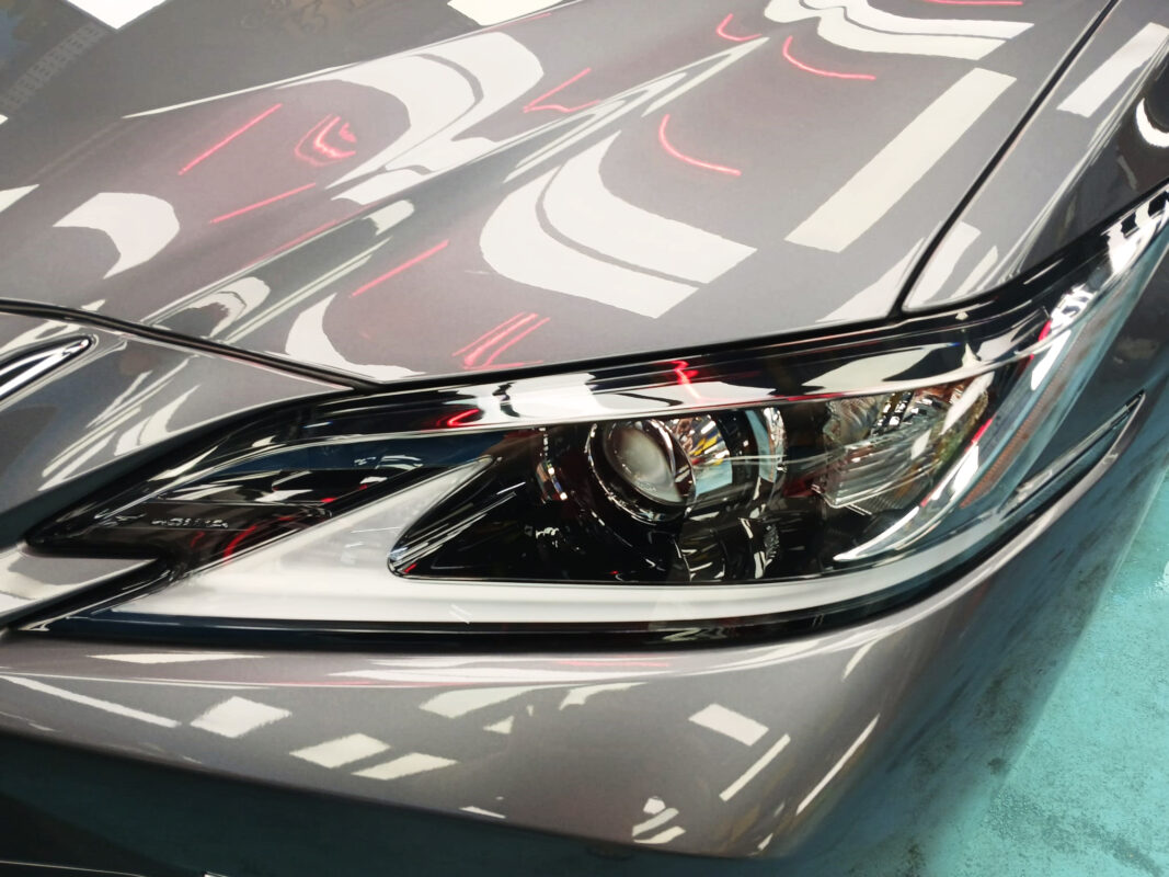 The ES300h's coated paintwork showing clean reflections.