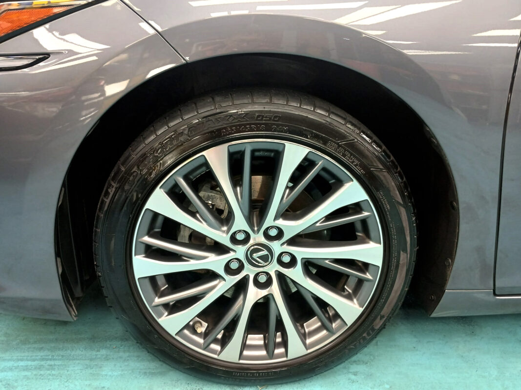 Rear quarter of the ES300h, glossy and protected.