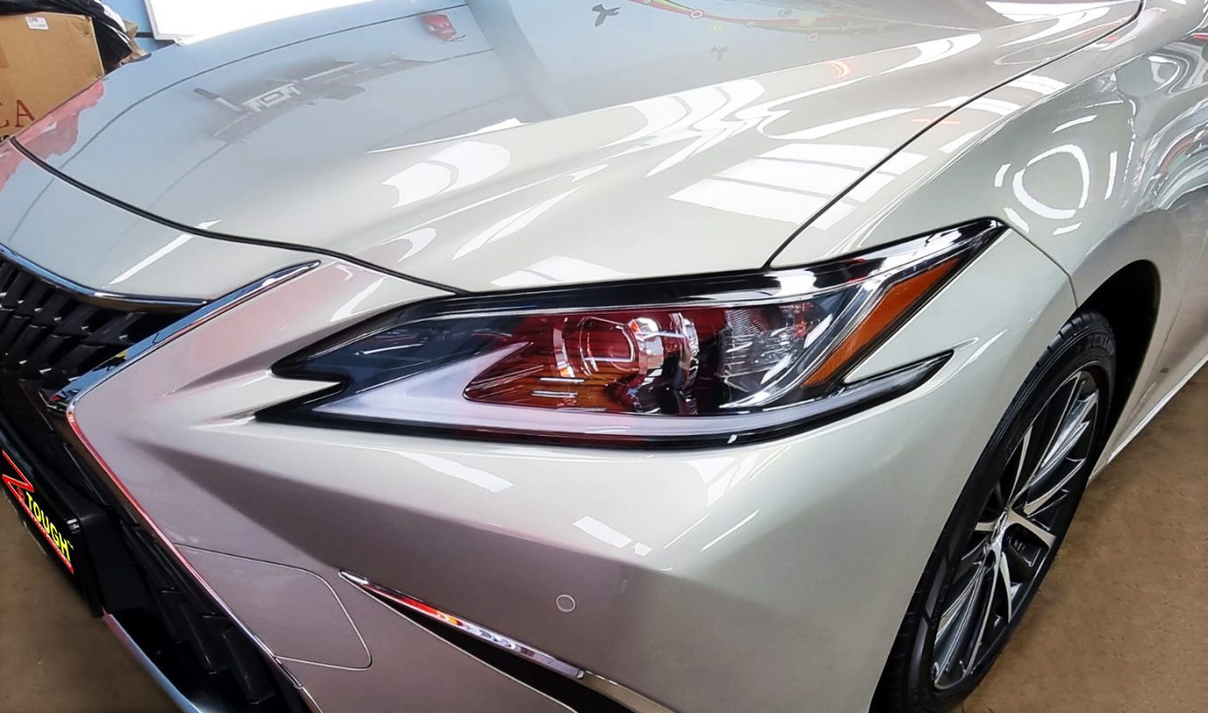The ES300h's coated paintwork showing clean reflections.