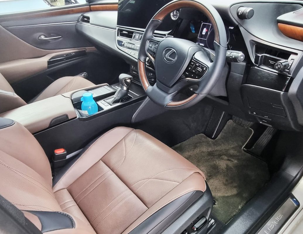 The Lexus ES300h parked in the workshop, freshly coated.