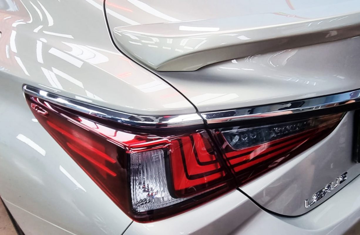 Rear quarter of the Lexus ES300h, glossy and protected.