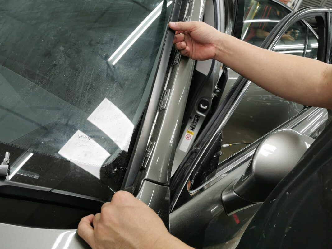 Polishing the new paint on the Lexus ES300H to bring up the shine.