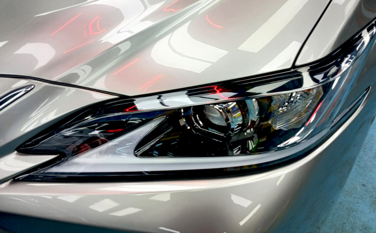 The ES300h's coated paintwork showing clean reflections.