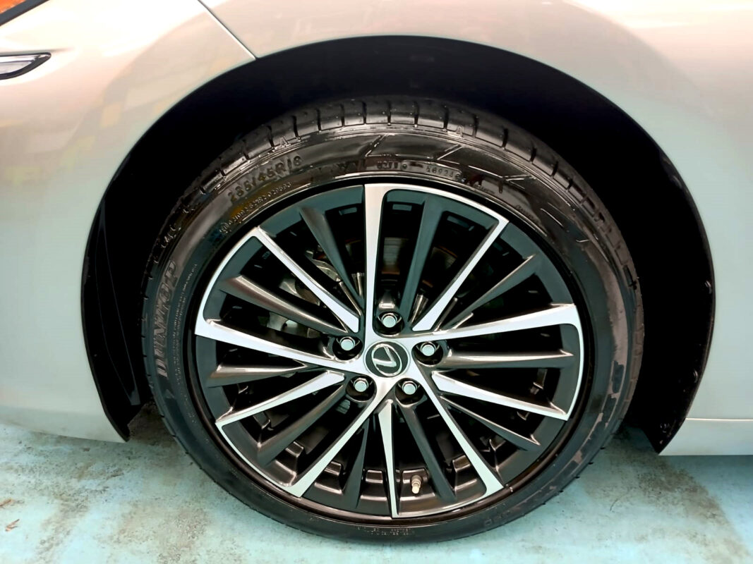 Rear quarter of the ES300h, glossy and protected.
