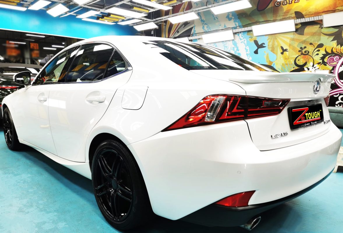 Rear quarter of the Lexus IS200t, glossy and protected.