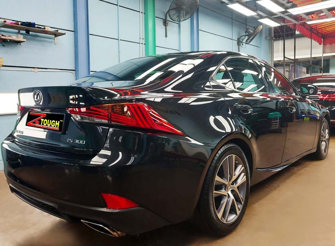 Rear quarter of the Lexus IS300, glossy and protected.