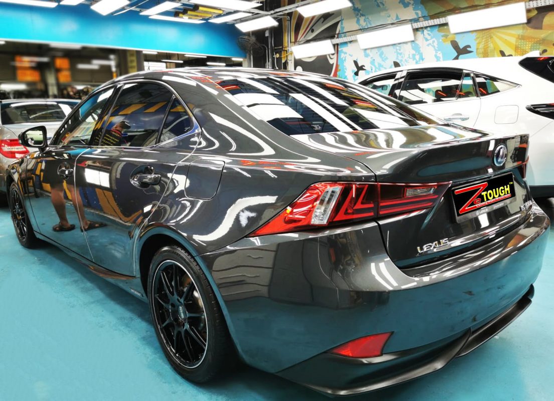 Rear quarter of the Lexus IS300h, glossy and protected.