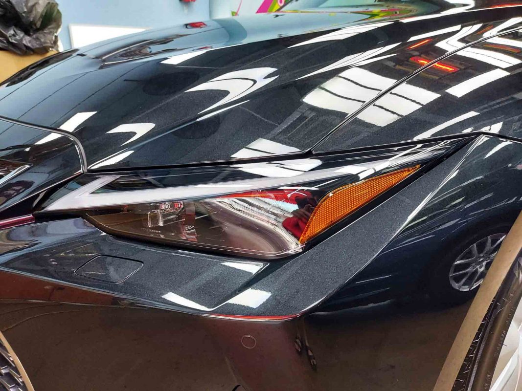 The IS300h's coated paintwork showing clean reflections.