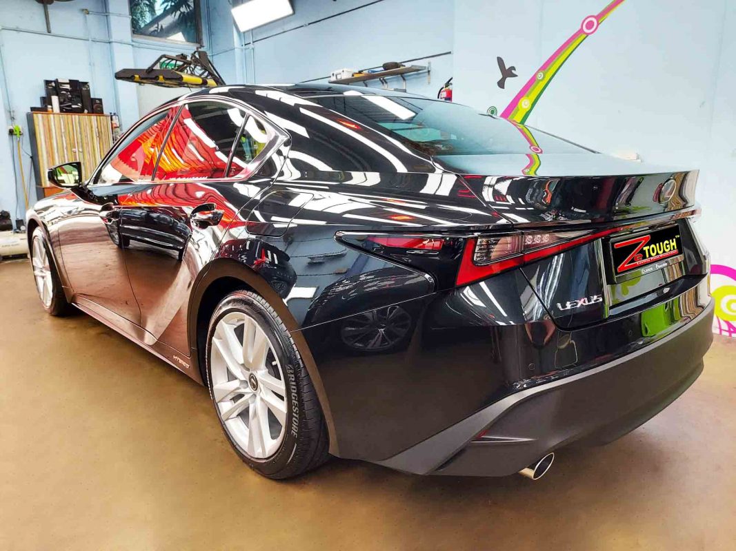 Rear quarter of the Lexus IS300h, glossy and protected.