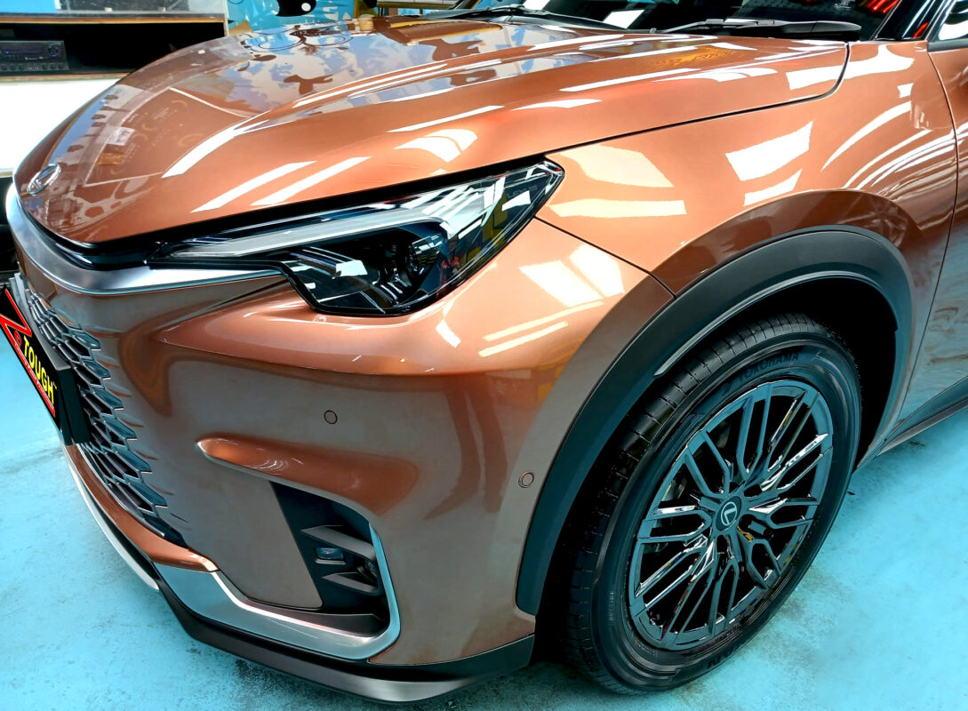 The Lexus LBX from a side angle after the ceramic coating.