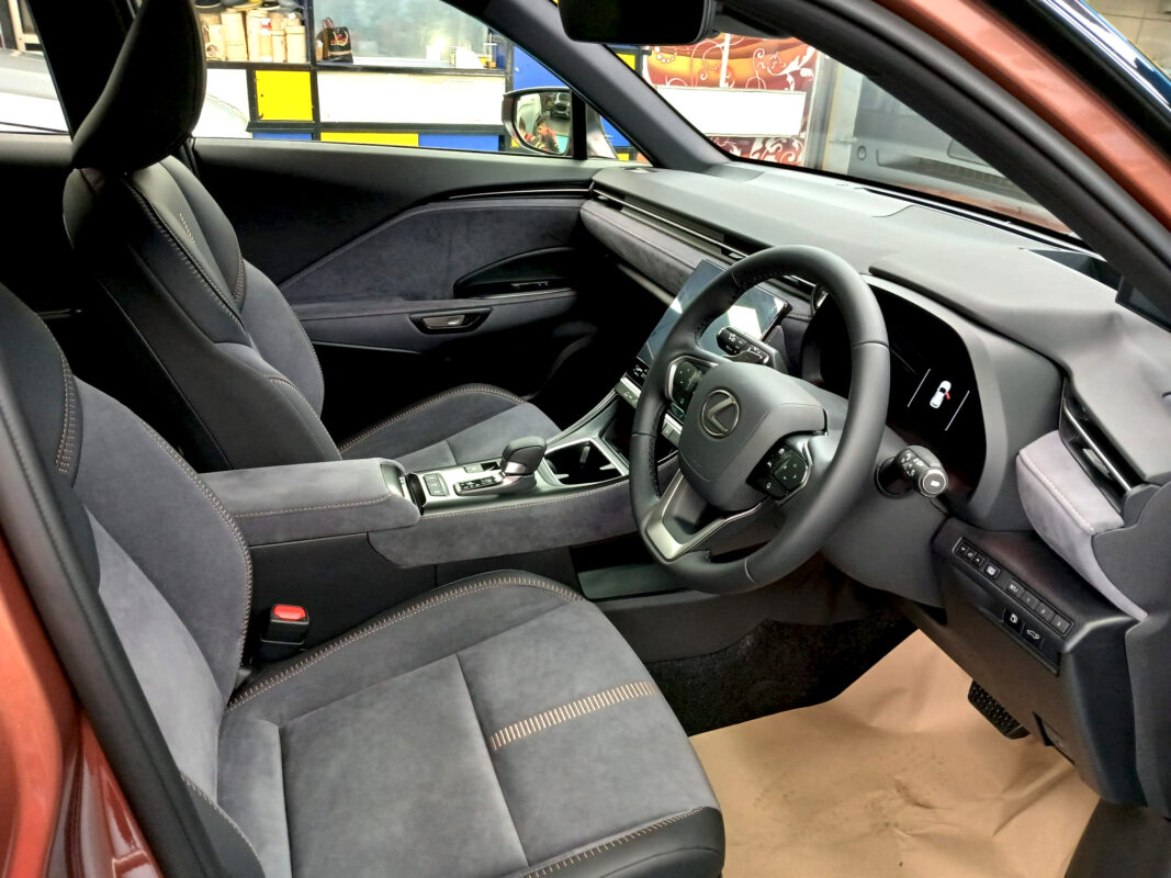 The Lexus LBX parked in the workshop, freshly coated.