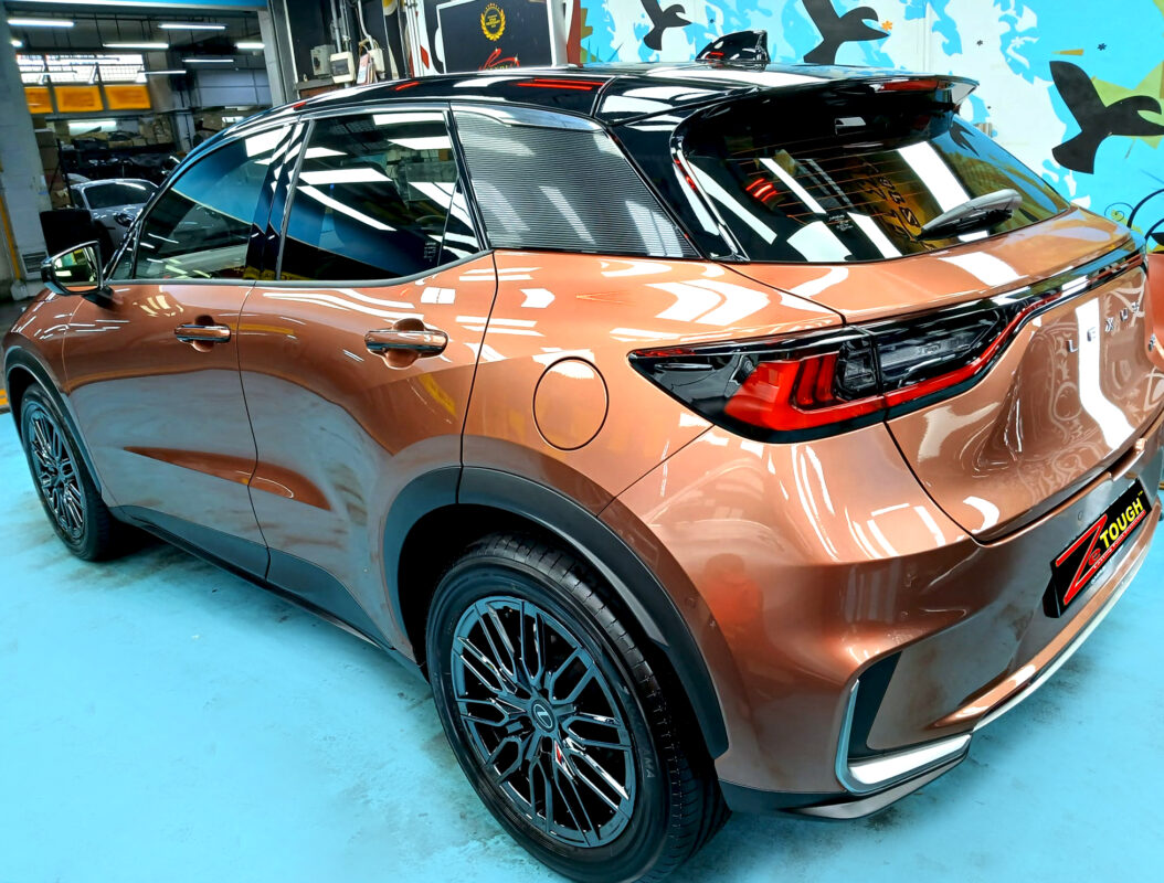 Rear quarter of the Lexus LBX, glossy and protected.