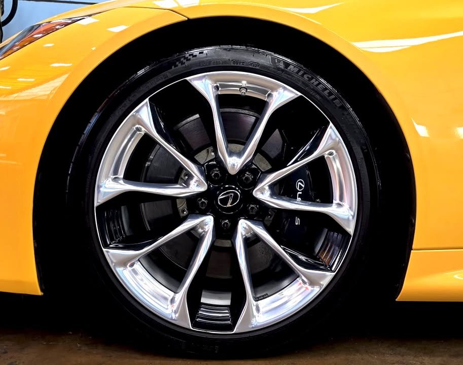 Close-up of the polished multi-spoke Lexus alloy wheel.