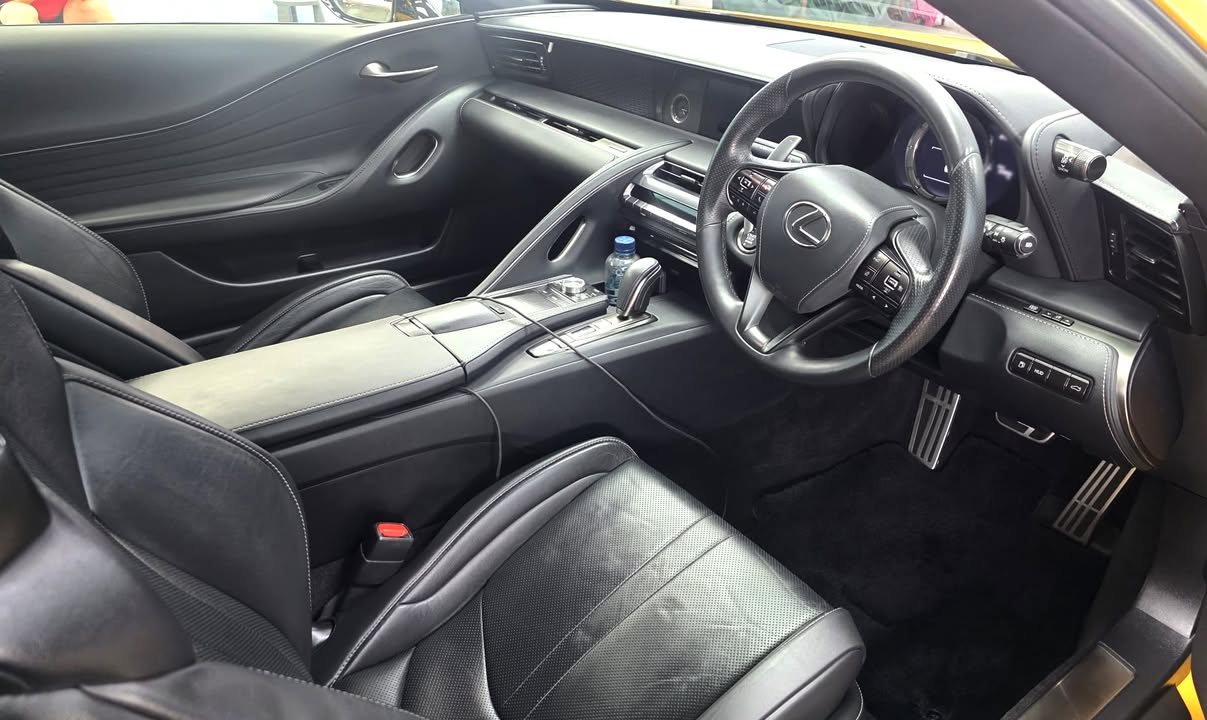 LC 500 interior with black leather seats and steering wheel after grooming.