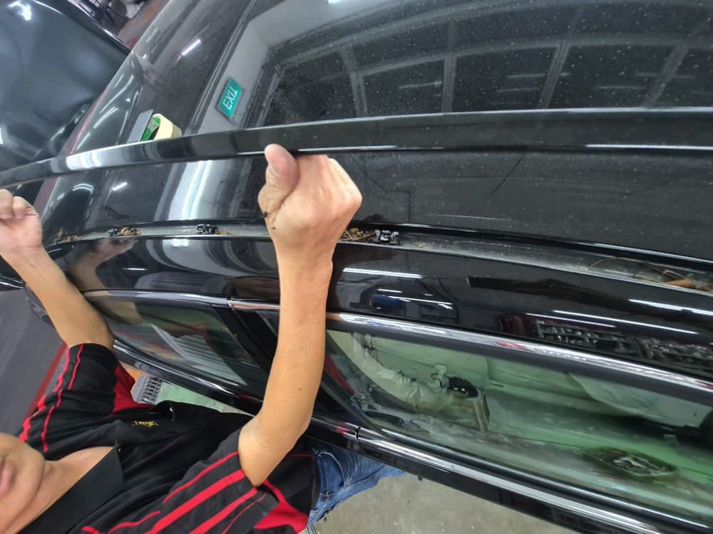 Removed parts set aside as the LS 460 is prepared for the respray.