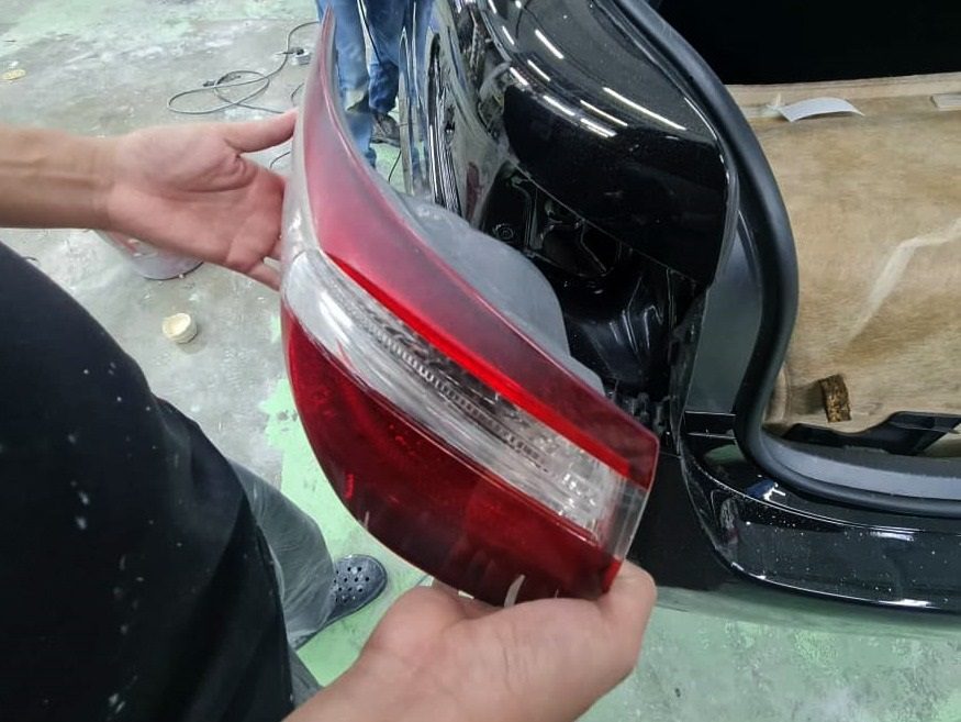 Polishing the new paint on the LS 460 to bring up the shine.
