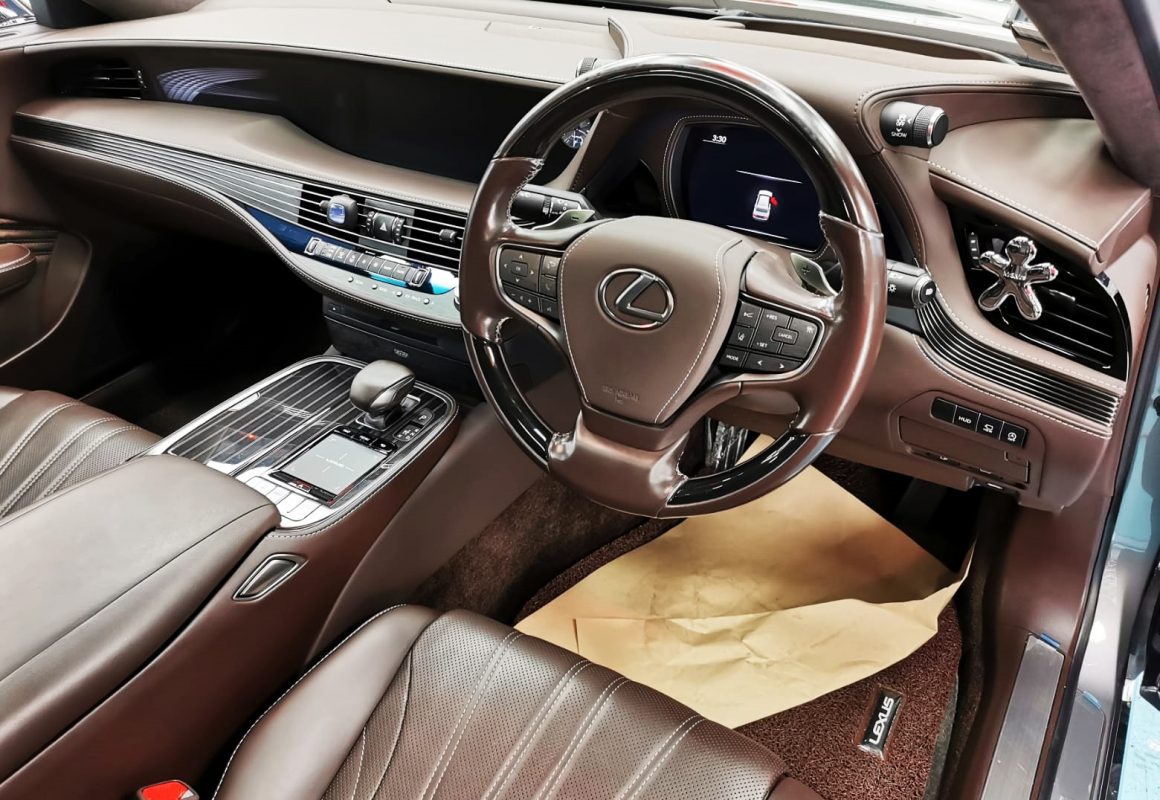 The Lexus LS350 parked in the workshop, freshly coated.