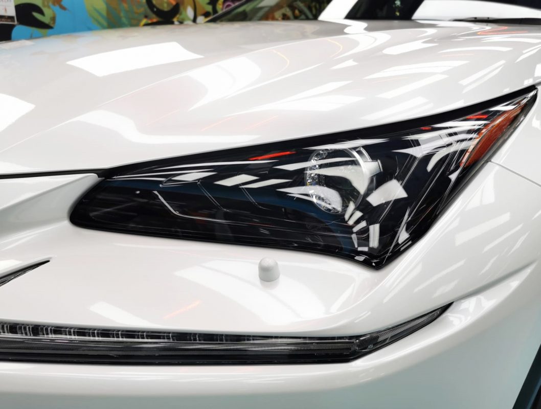 The NX300's coated paintwork showing clean reflections.