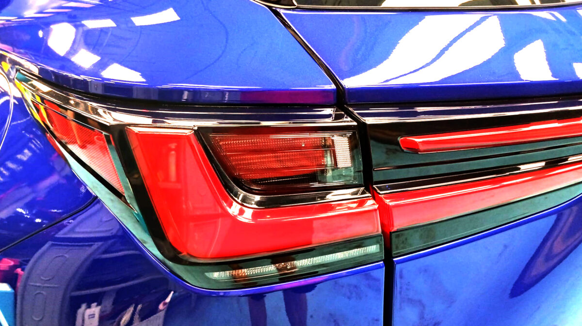 Rear quarter of the NX350, glossy and protected.