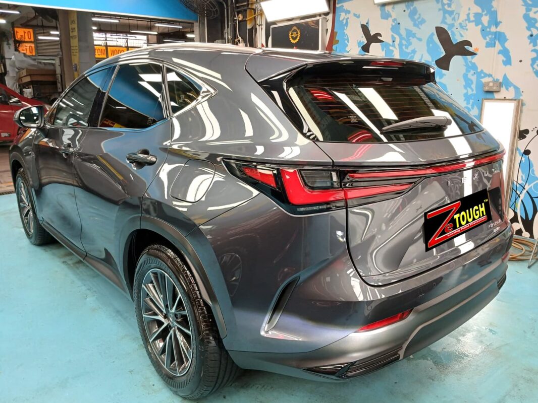 Rear quarter of the NX350h, glossy and protected.