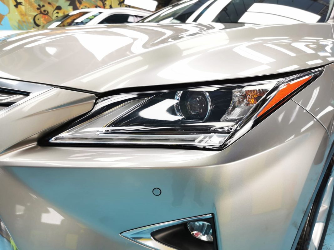 The RX200T's coated paintwork showing clean reflections.