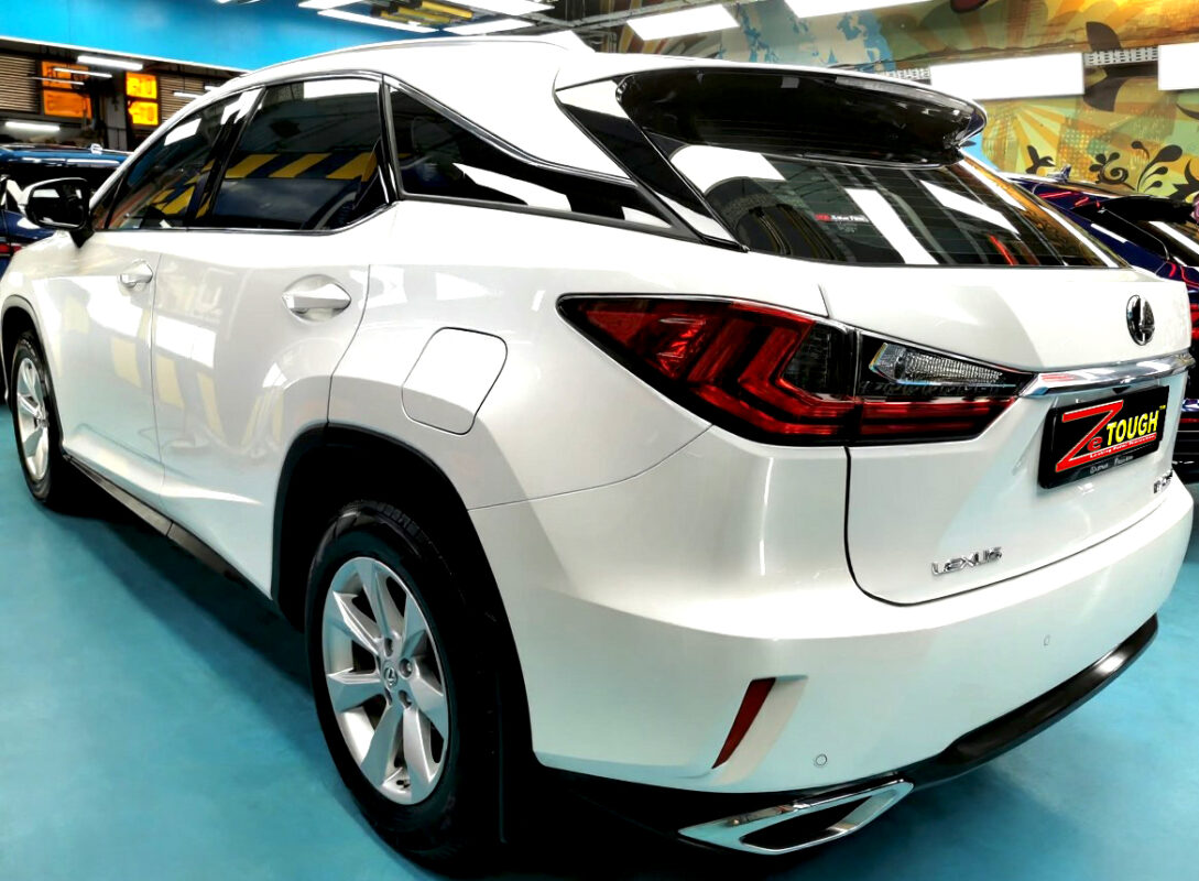Rear quarter of the RX200t, glossy and protected.