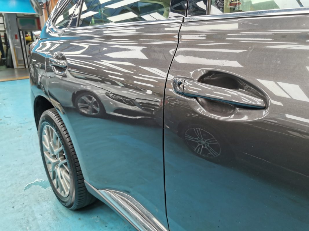 The Lexus RX350 from a side angle after respray and ceramic coating.