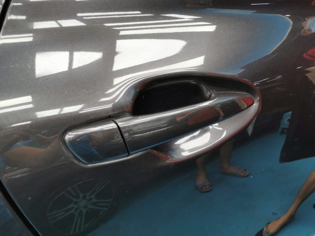 The Lexus RX350 parked in the workshop, freshly sprayed and coated.