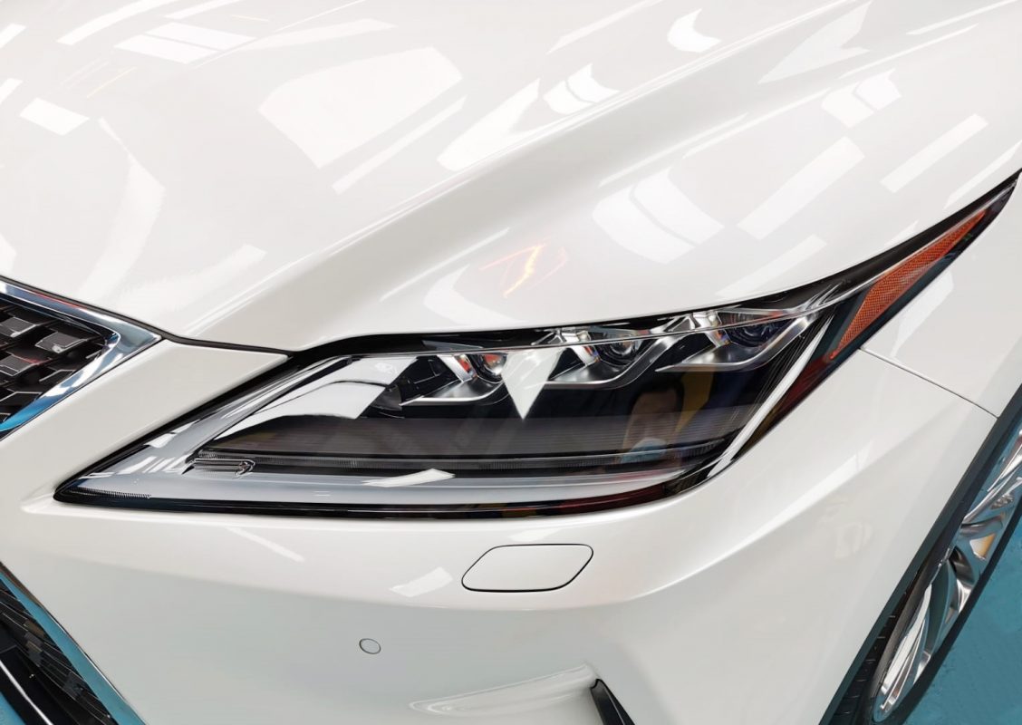 The RX350's coated paintwork showing clean reflections.