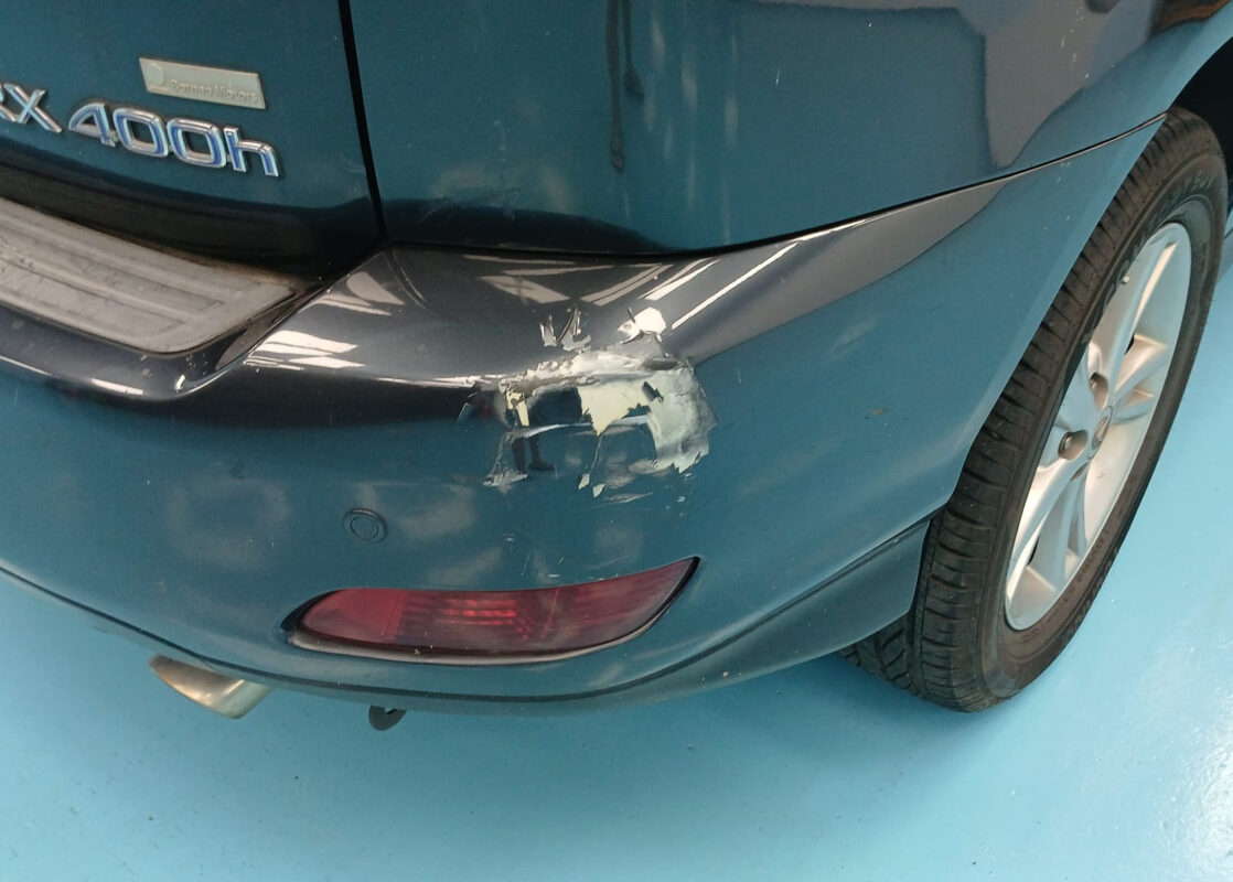 Side view of the Lexus RX400h on arrival, showing the paint condition.