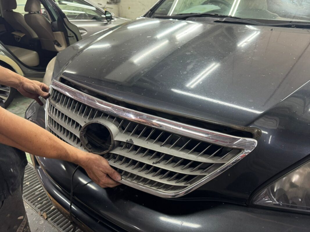 The Lexus RX400h with panels and parts removed at the start of strip-down.