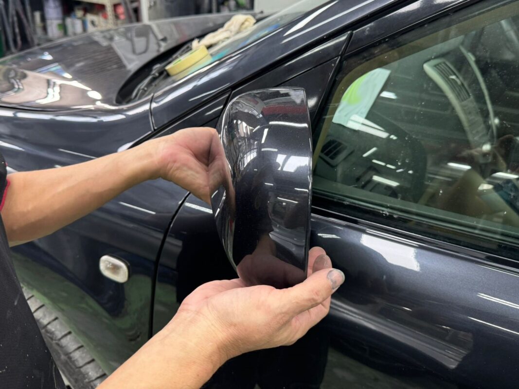 Polishing the Lexus RX400h after the oven-baked coat to bring up the shine.